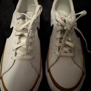 Nike White Sneakers with Black and Brown Accents